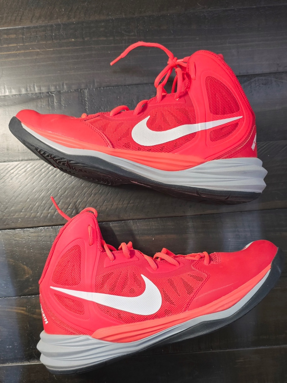 Nike Red High-Top Basketball Shoes with White Swoosh